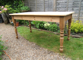 stripped and sanded wooden table